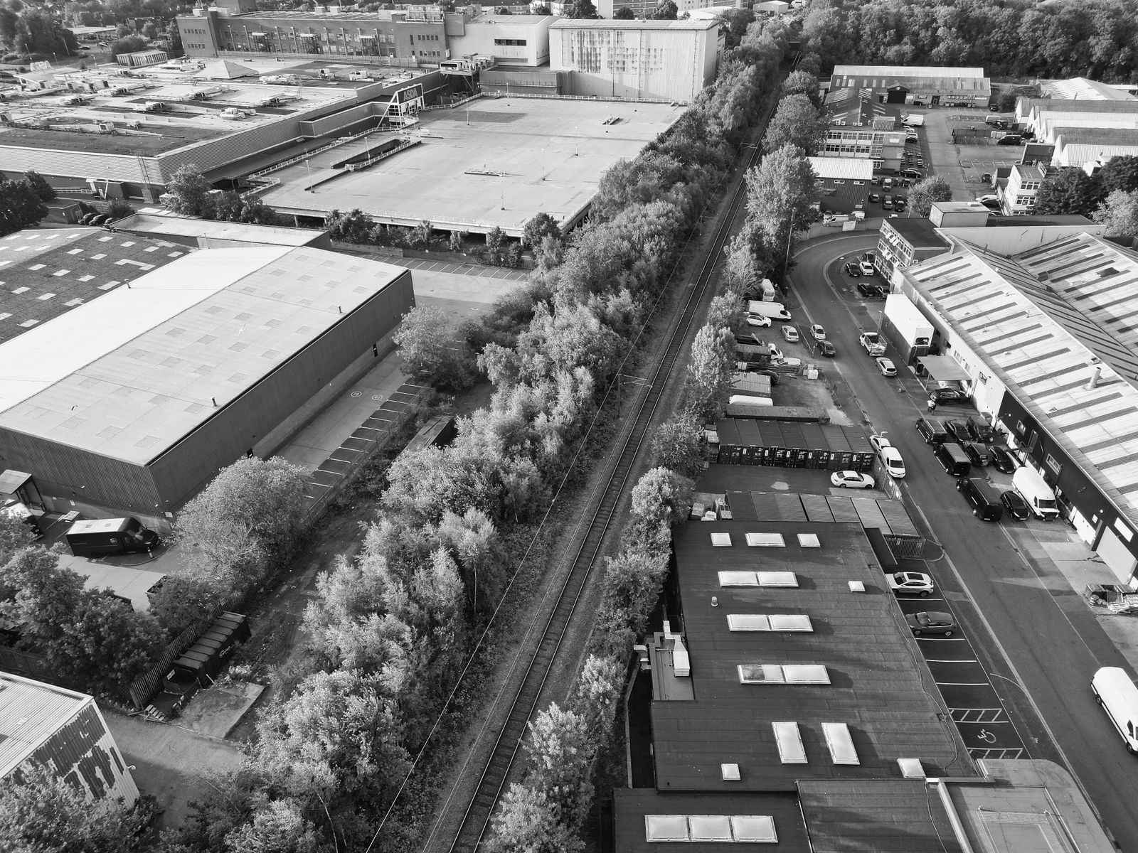 Aerial view of an industrial district with rail and warehouse infrastructure